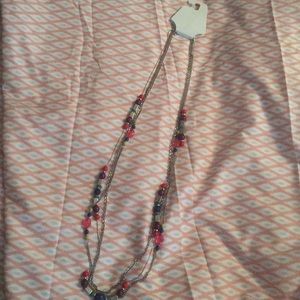 Beaded and silver tone necklace. Approx. 24in